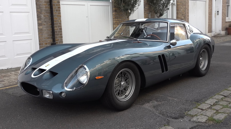 A gray Ferrari 250 GTO parked
