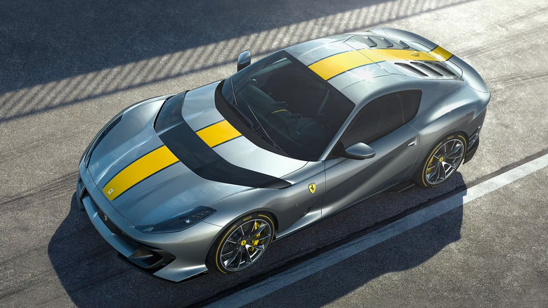 A gray and yellow Ferrari 812 Competizione