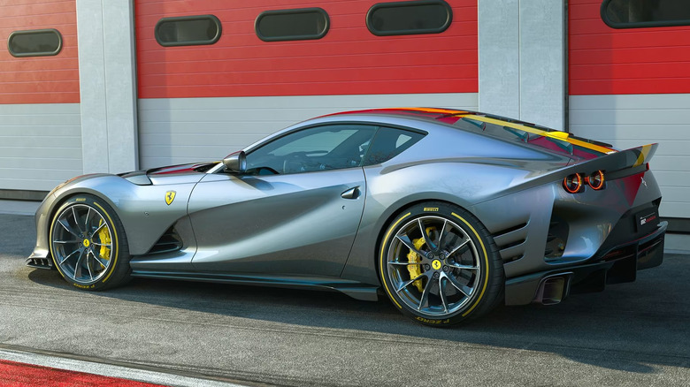 A gray and yellow Ferrari 812 Competizione