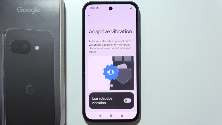 Turning on the Adaptive Vibration setting on a Google Pixel phone.