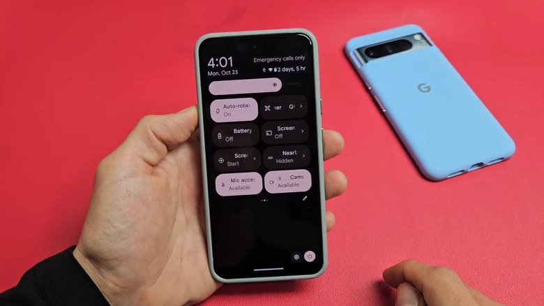 Selecting the auto-rotate feature on a Pixel phone.