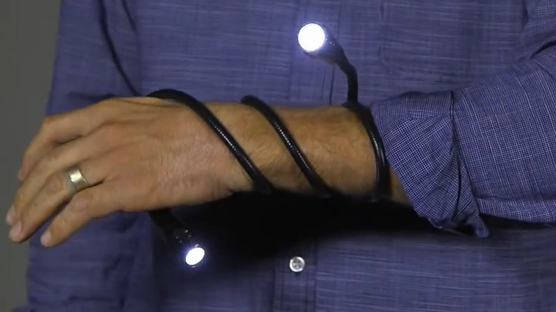 Flexible flashlight wrapped around arm