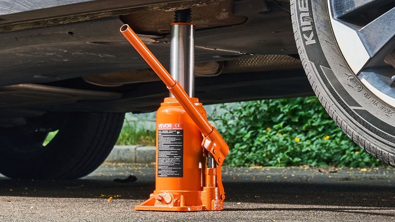 Vevor 20 ton Hydraulic Bottle Jack lifting a car