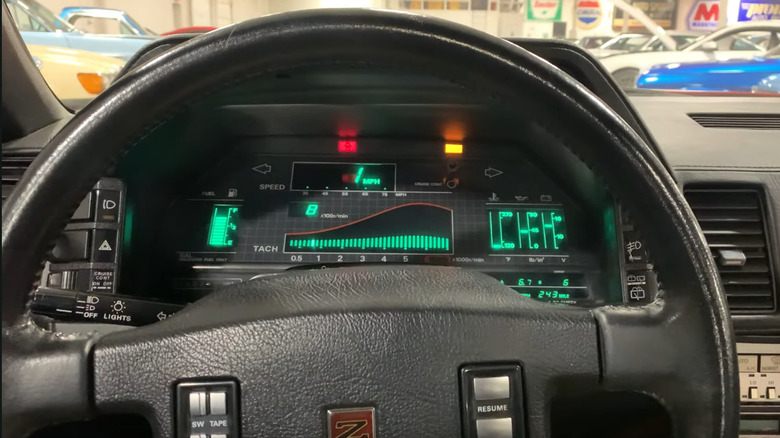 A driver's view of a 1986 Nissan 300ZX digital dashboard.
