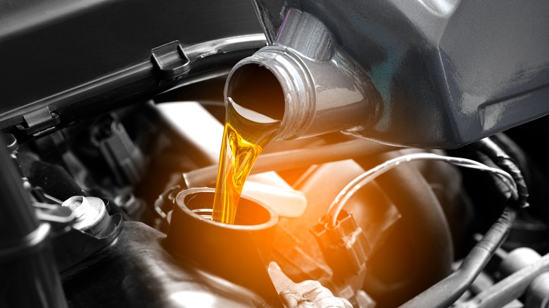Pouring oil into car components