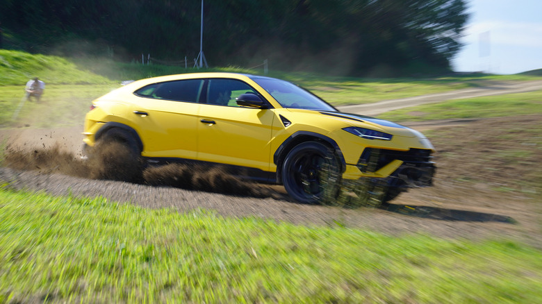 Lamborghini Urus Performante drifting on a dirt track