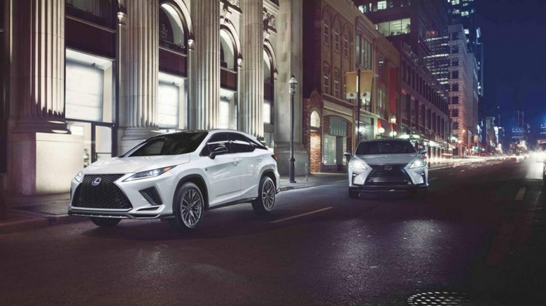 2022 Lexus RX 350L and 450hL SUVs on street 