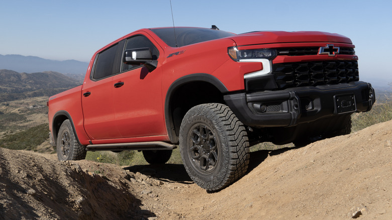 2023 Chevrolet Silverado ZR2 Bison front-three quarters with wheel in rut