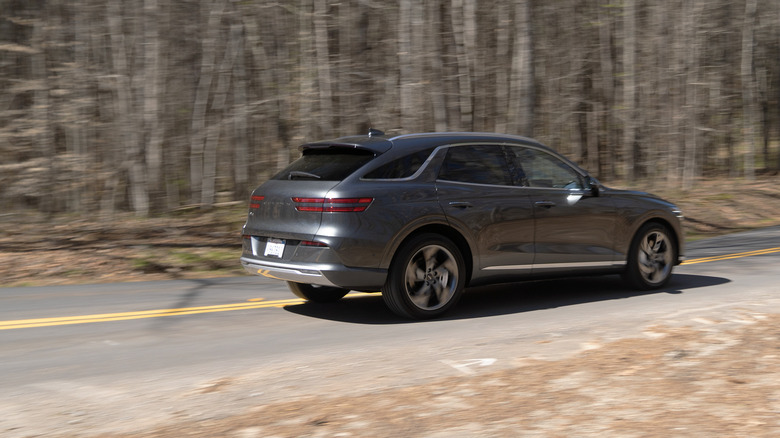 Genesis Electrified GV70 rear end driving on a Georgia back road