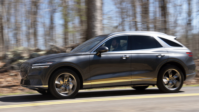 Genesis Electrified GV70 driving on a Georgia back road