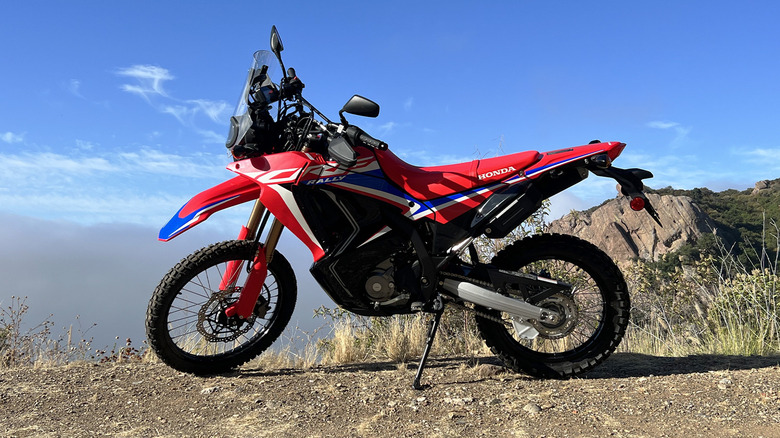 2023 Honda CRF300L Rally side profile with sky