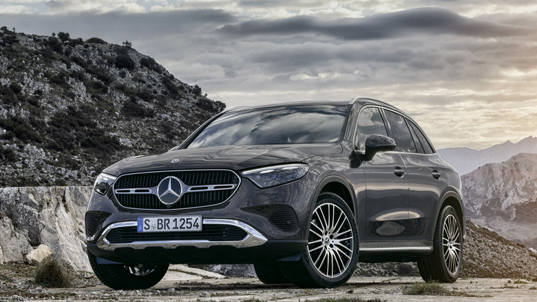 A Mercedes-Benz GLC SUV 2023 on a rugged mountain 