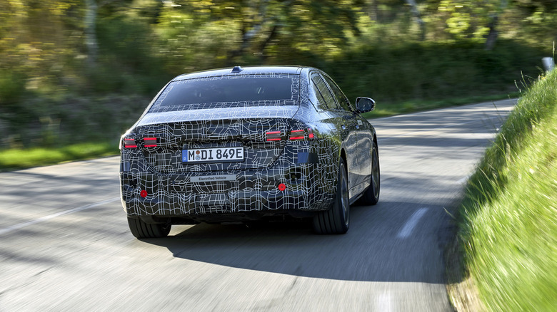 2024 BMW i5 prototype rear in motion