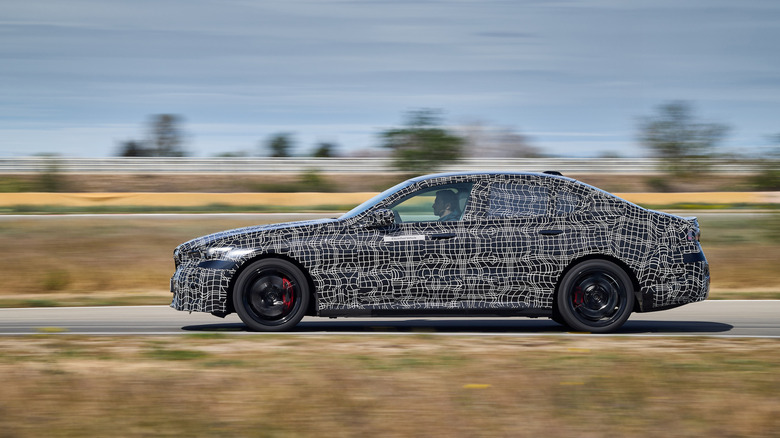 2024 BMW i5 prototype side profile in motion