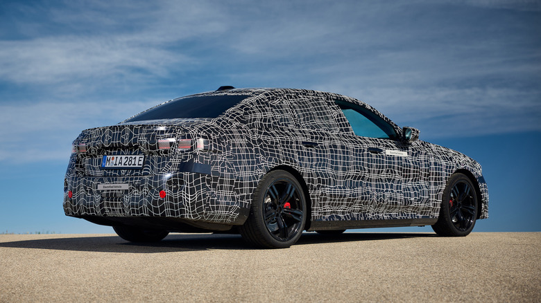 2024 BMW i5 prototype rear three-quarter