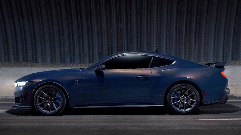 2024 Ford Mustang Dark Horse side view in tunnel