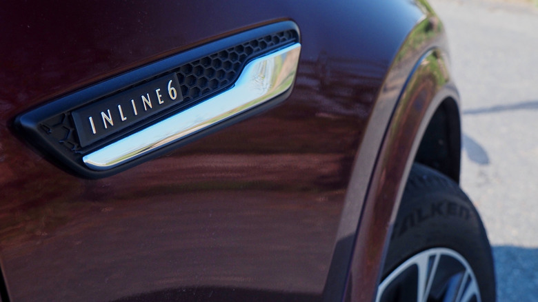 2024 Mazda CX-90 front quarter badge