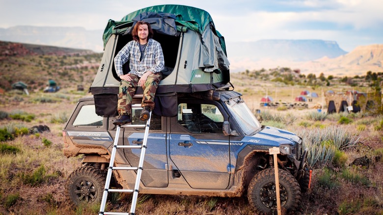 Talon Homer camping out in the Polaris XPedition roof tent