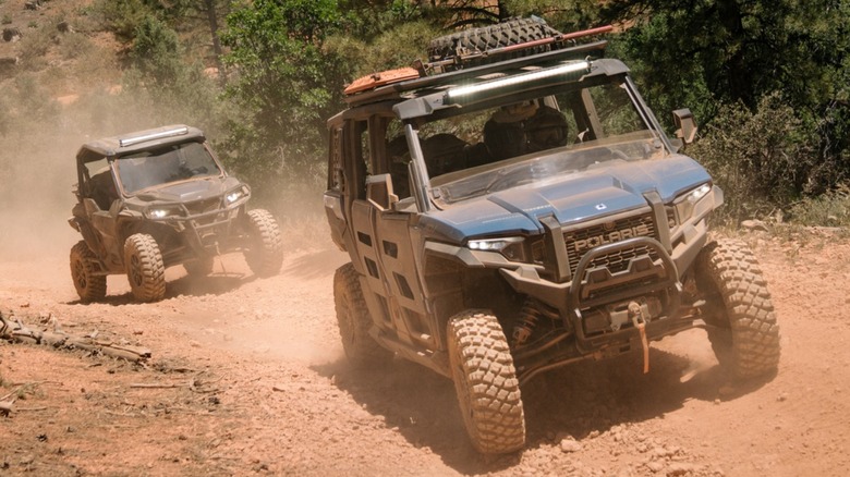 Multiple Polaris XPedition vehicles off-roading
