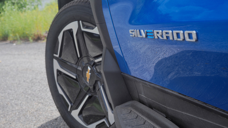 2025 Chevrolet Silverado EV badge and front wheel