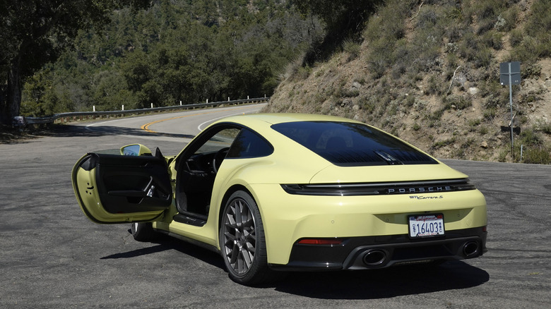 2025 Porsche 911 Carrera S rear three quarters with door open