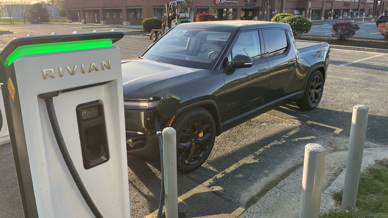 Rivian R1T charging at Rivian branded charger