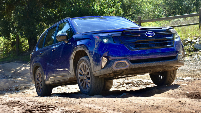 2025 Subaru Forester Hybrid climbing a hill.