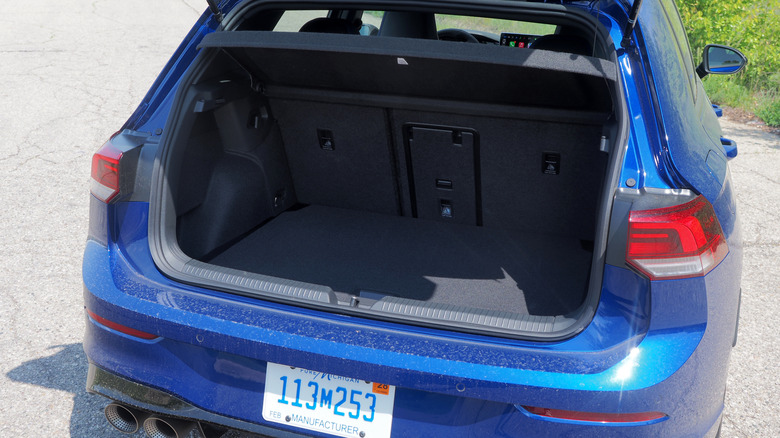 2025 VW Golf R trunk open with rear bench upright