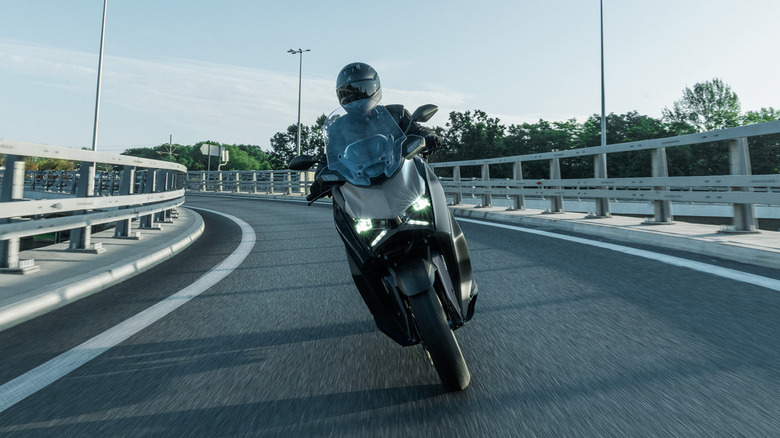 New 2025 Yamaha XMAX Scooter with rider on off ramp