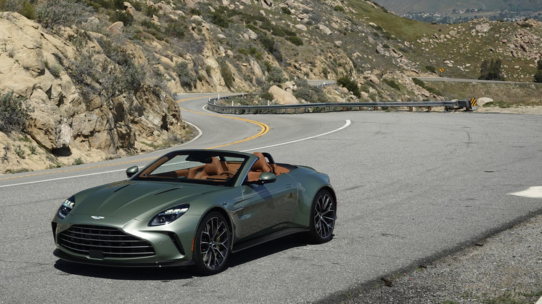 2026 Aston Martin Vantage Roadster front three-quarters on a mountain road