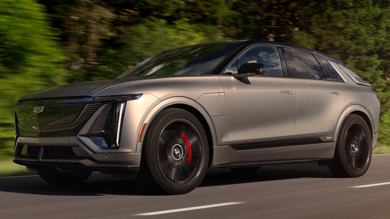 Driver side view of 2026 Cadillac Lyriq-V driving on road