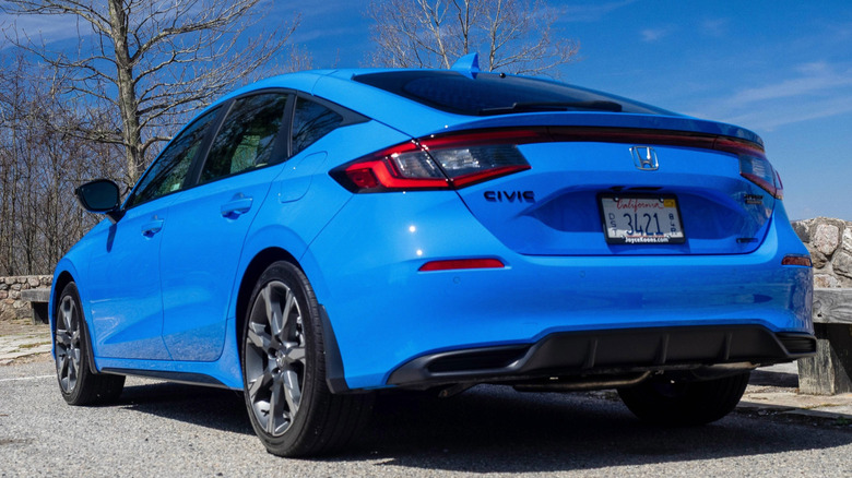 2026 Honda Civic Hatchback Hybrid left rear three-quarter view