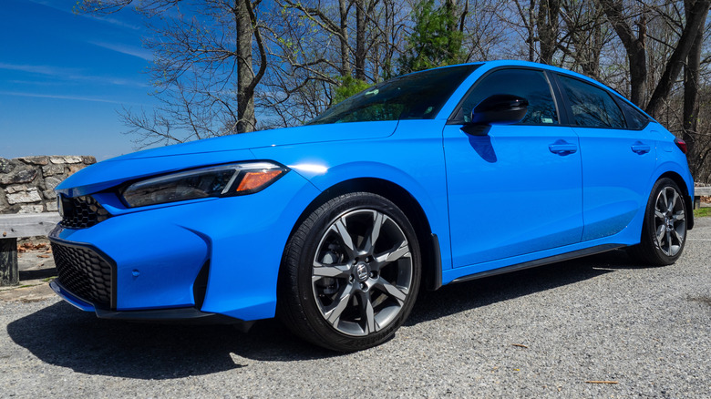 2026 Honda Civic Hatchback Hybrid left front three-quarter view