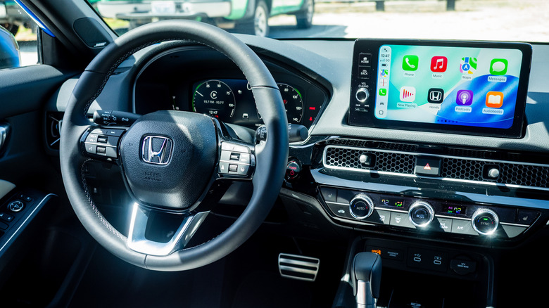 2026 Honda Civic Hatchback Hybrid steering wheel, dashboard and touchscreen
