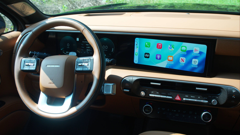 2026 Hyundai Palisade Hybrid dashboard view with Apple CarPlay on the center dash touchscreen