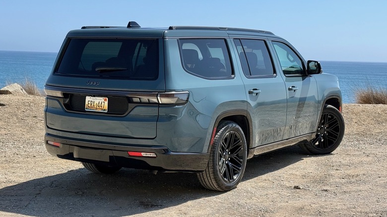 2026 Jeep Grand Wagoneer rear 3/4 parked near the beach