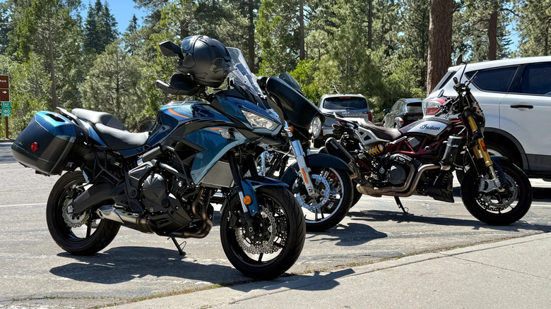 2026 Kawasaki Versys 650 parked next to two other motorcycles