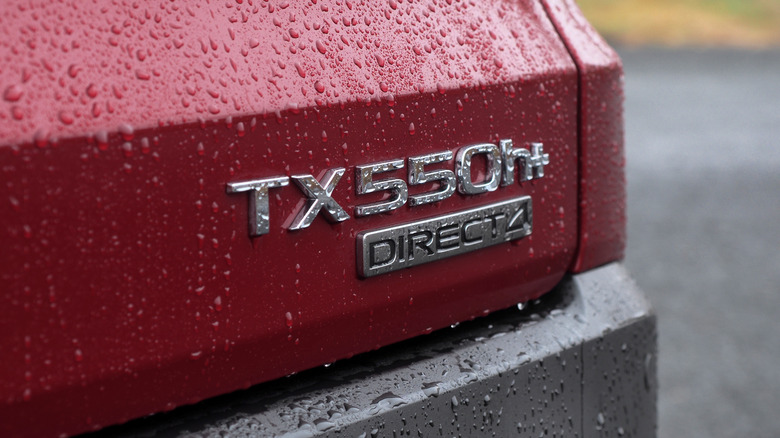 TX 550h+ badge on rear