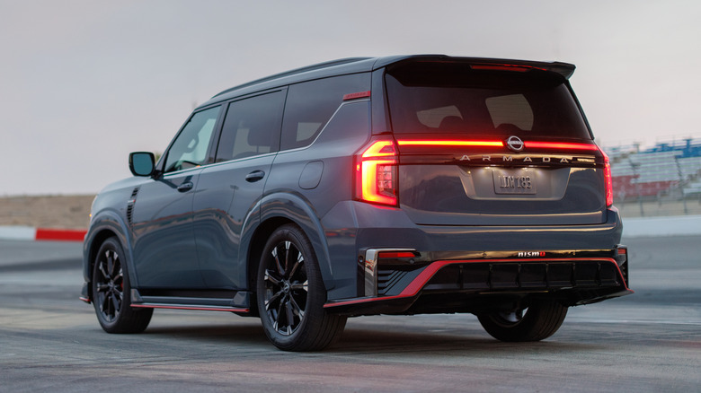 Rear quarter view of 2026 Nissan Armada Nismo parked on track
