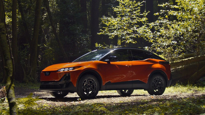 2026 Subaru Uncharted EV parked in the woods
