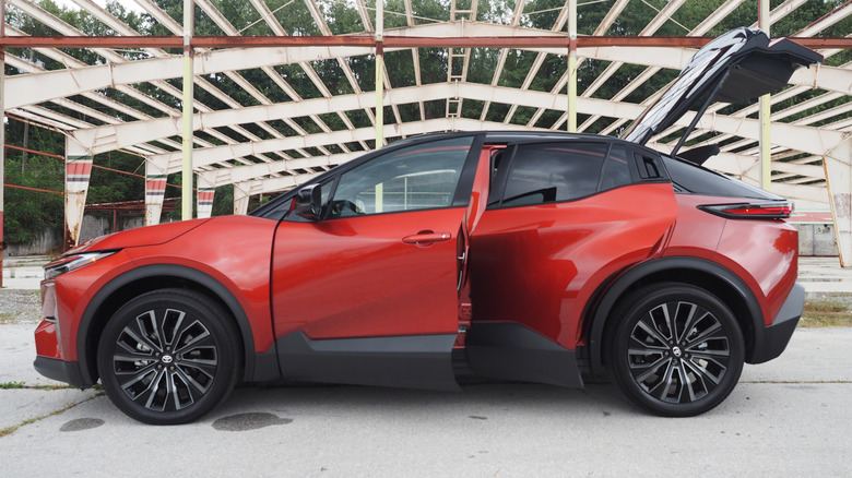 2026 Toyota C-HR XSE left profile view with doors and hatch open