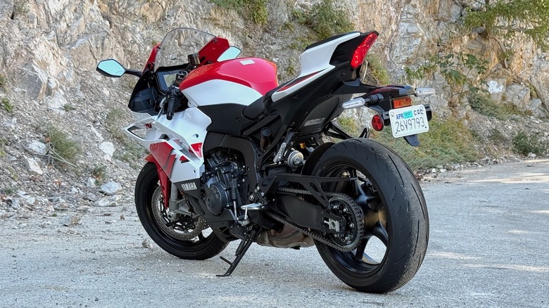 2026 Yamaha R9 70th Anniversary Edition rear 3/4 parked by a mountainside