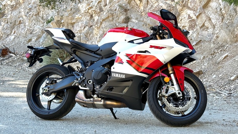 2026 Yamaha R9 70th Anniversary Edition side profile parked on the side of a mountain road