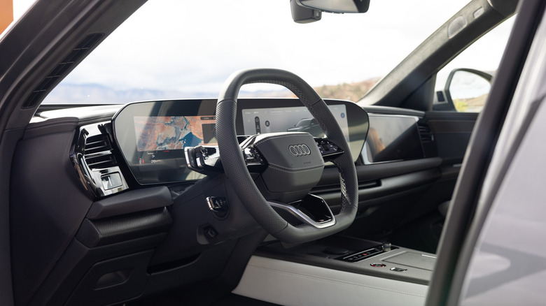 2027 Audi SQ9 steering wheel and dash detail