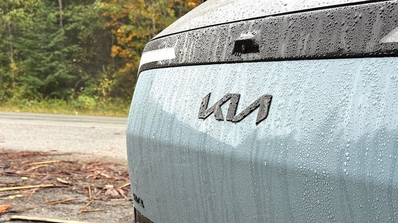 2027 Kia EV3 rear badge with rain running down it