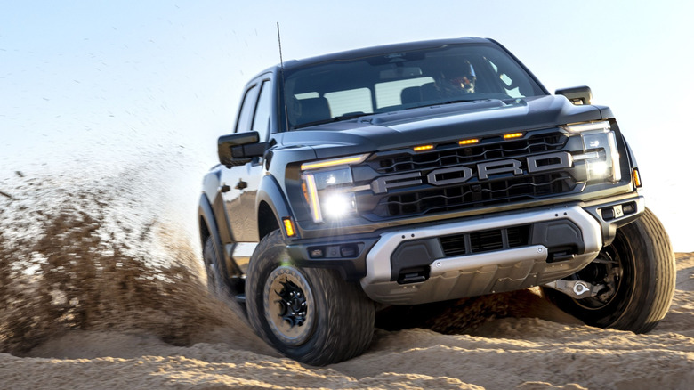 Ford F-150 Raptor off-roading in deep sand