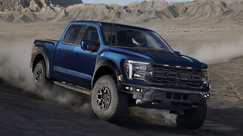 Ford F-150 Raptor driving through the desert