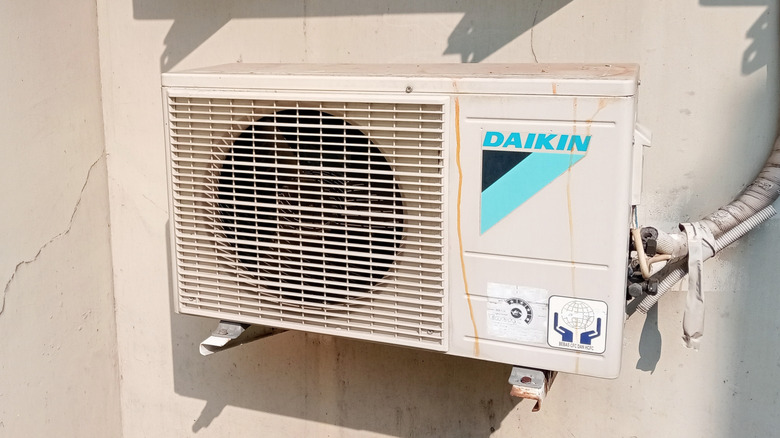Daikin air conditioner mounted on an exterior wall