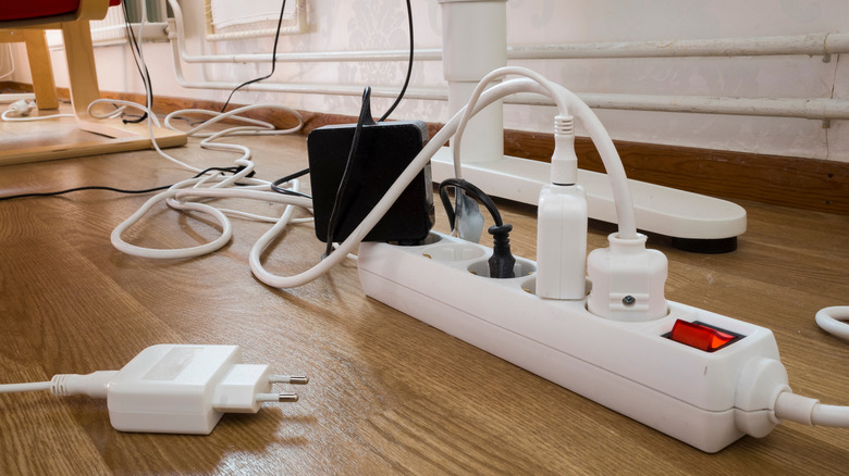 Power strip with cords plugged in