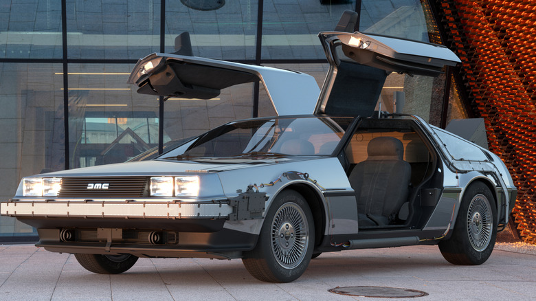A modified DMC DeLorean with its doors open.